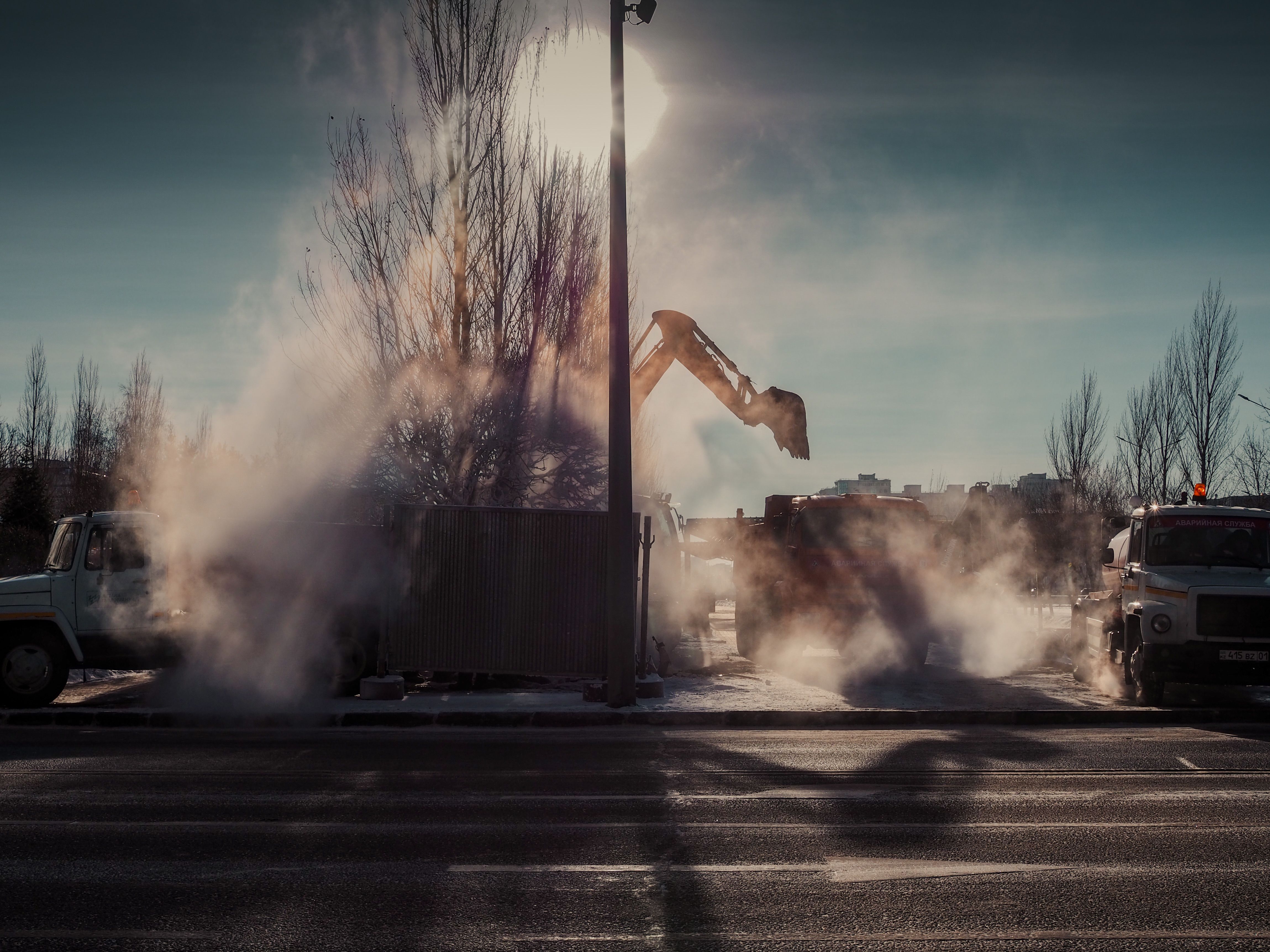 Construction crews and heavy equipment working on a job site